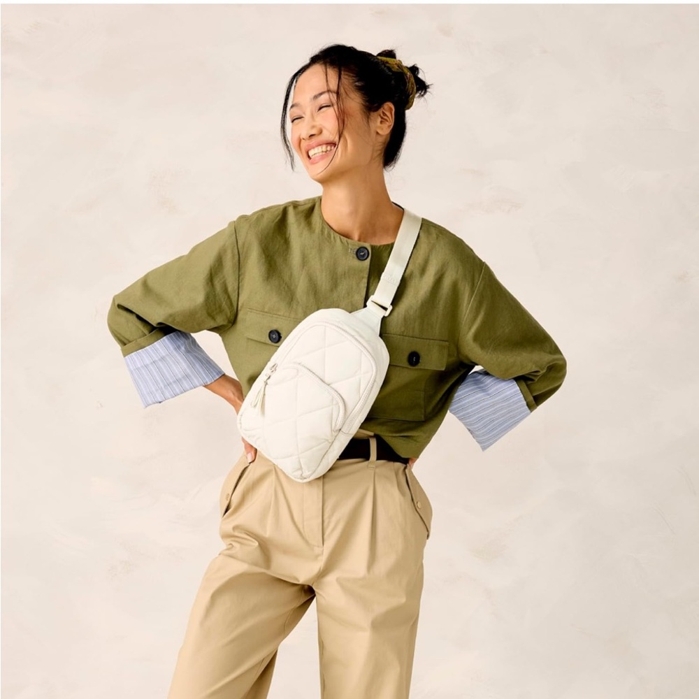 NWT Featherweight Sling Backpack Pumice Stone color